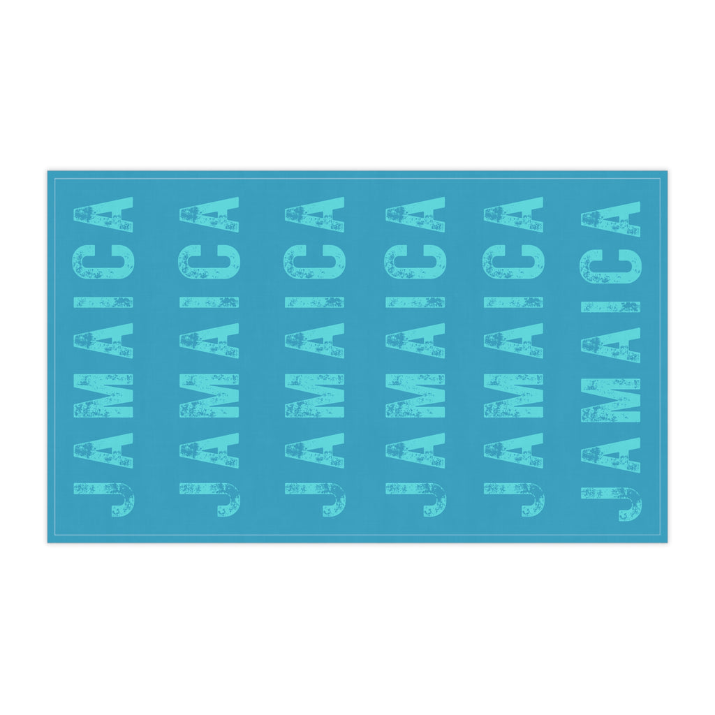 Turquoise Tea Cloth With Bold "Jamaica" Print.