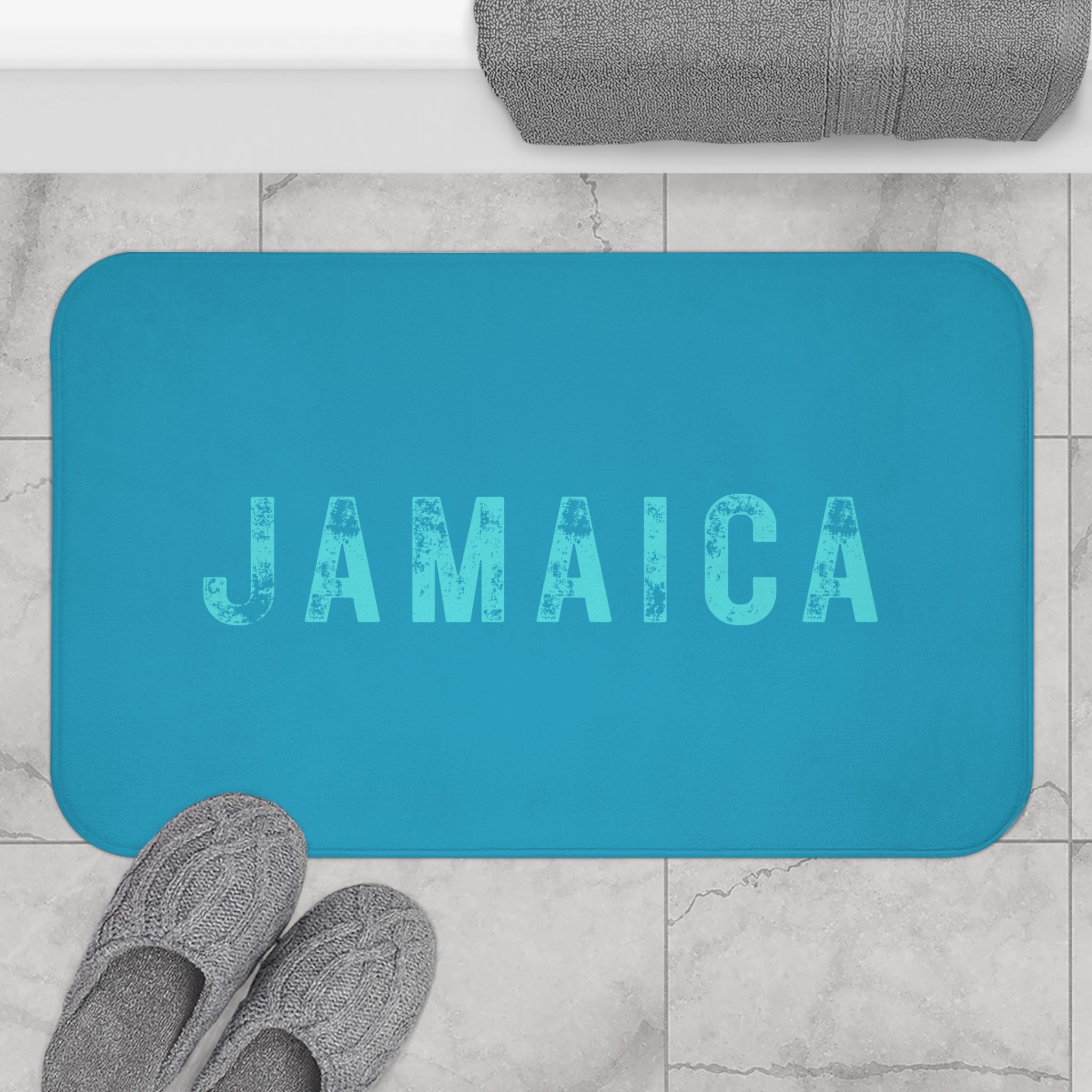 Bath Mat With Bold "Jamaica" Print.