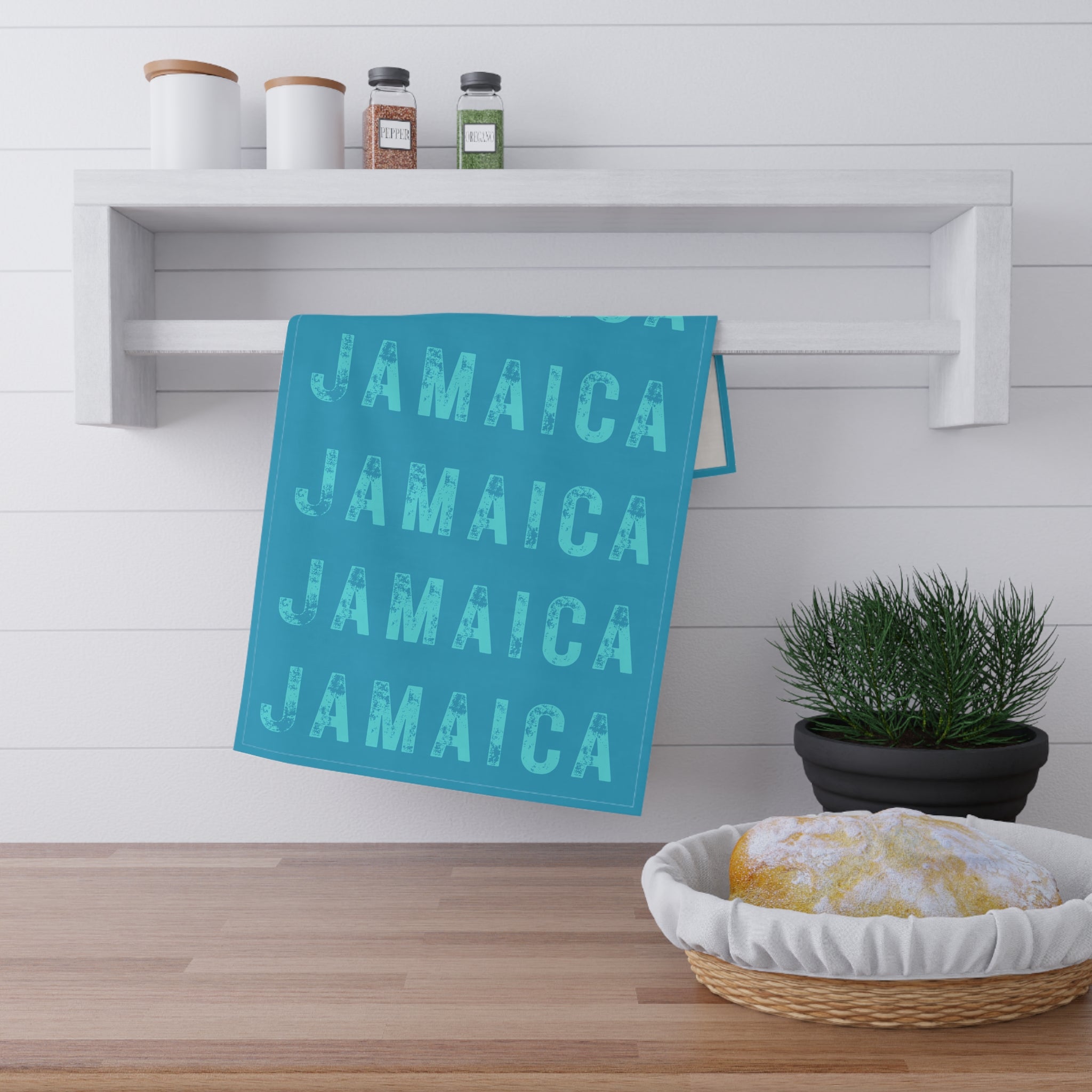 Turquoise Tea Cloth With Bold "Jamaica" Print.